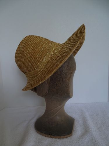 This straw shape was made for a private client in the summer of 2017.  She wanted a hat she could decorate herself.